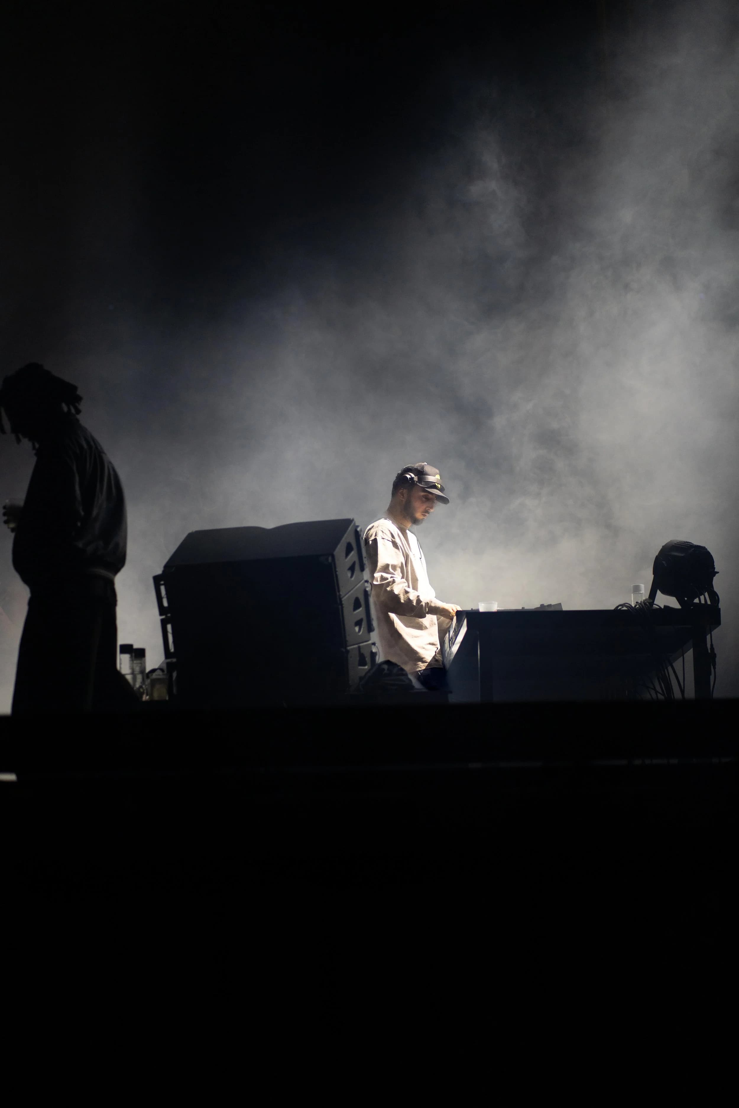 Artist backstage security in haze and lights
