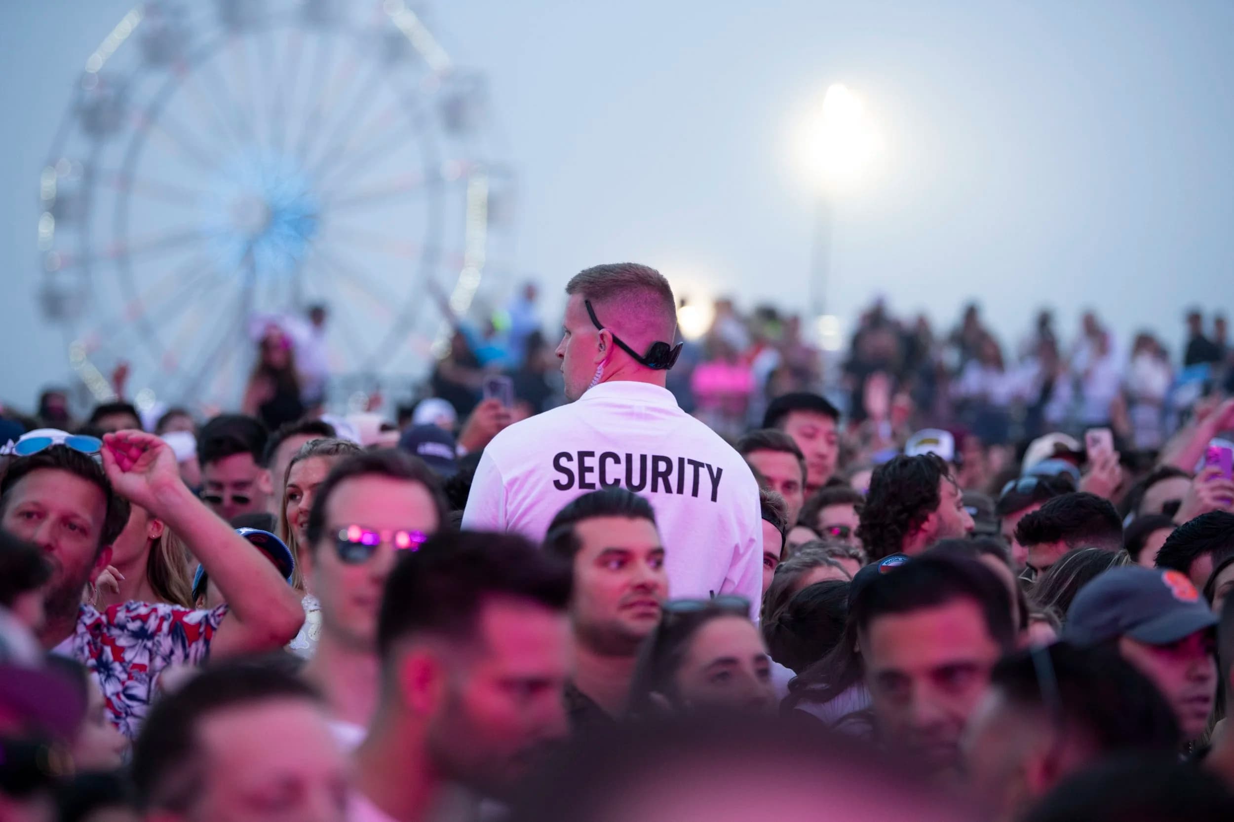 Celebrity event security team managing crowd at high-profile gathering